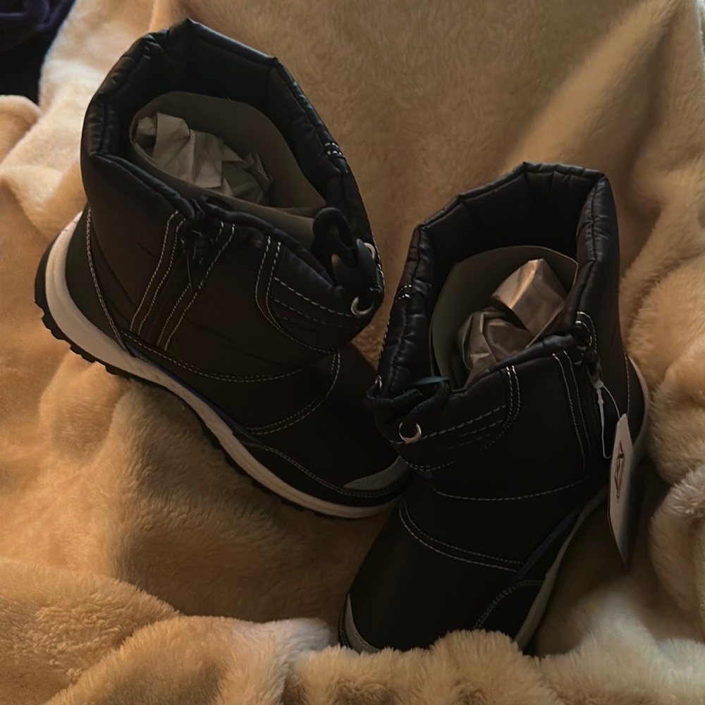 Brand New Snow Boots for a Little Boy. Never been worn.